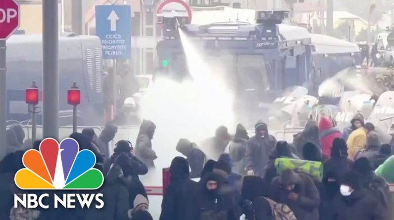 Poland Police Use Water Cannons Against Migrants